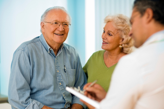 A senior couple visit their friendly doctor